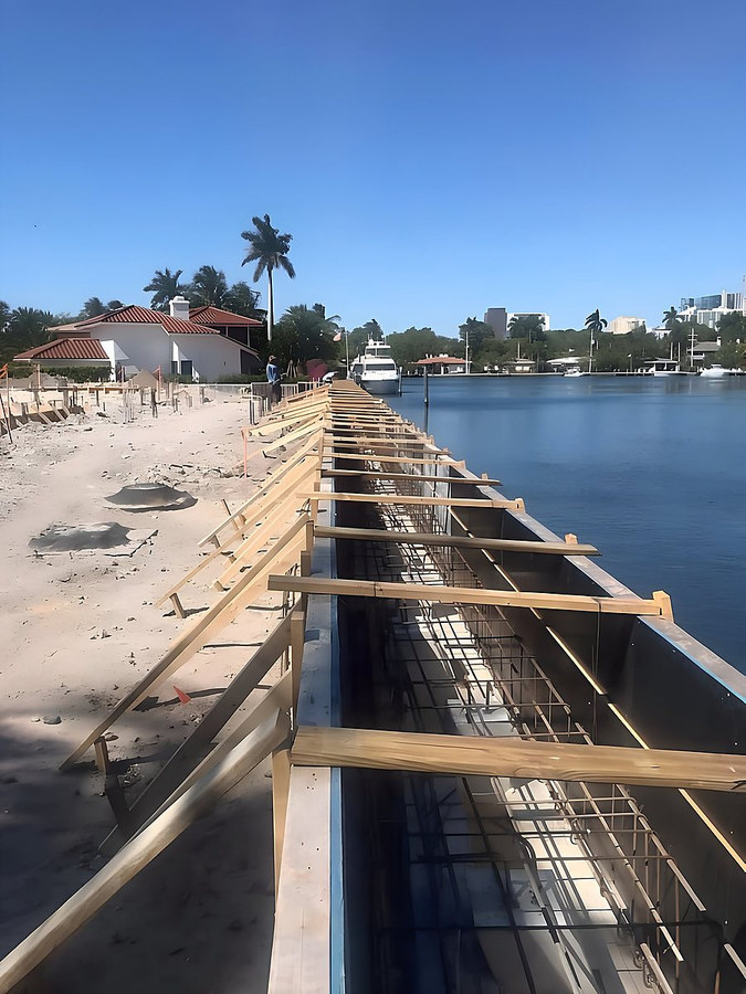 Seawall formwork and steel rebar reinforcement cage during construction — South Florida by Contour Marine